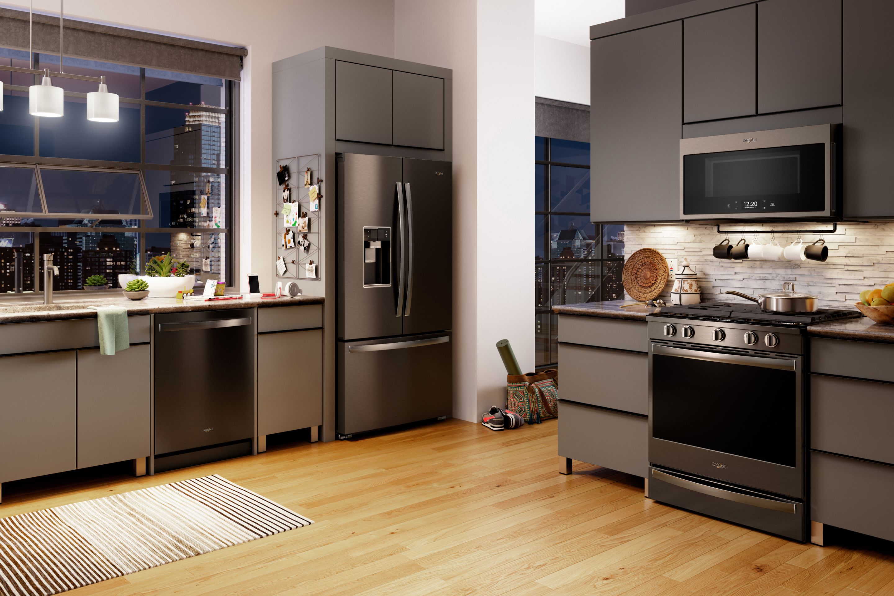black cabinets with stainless steel appliances        <h3 class=