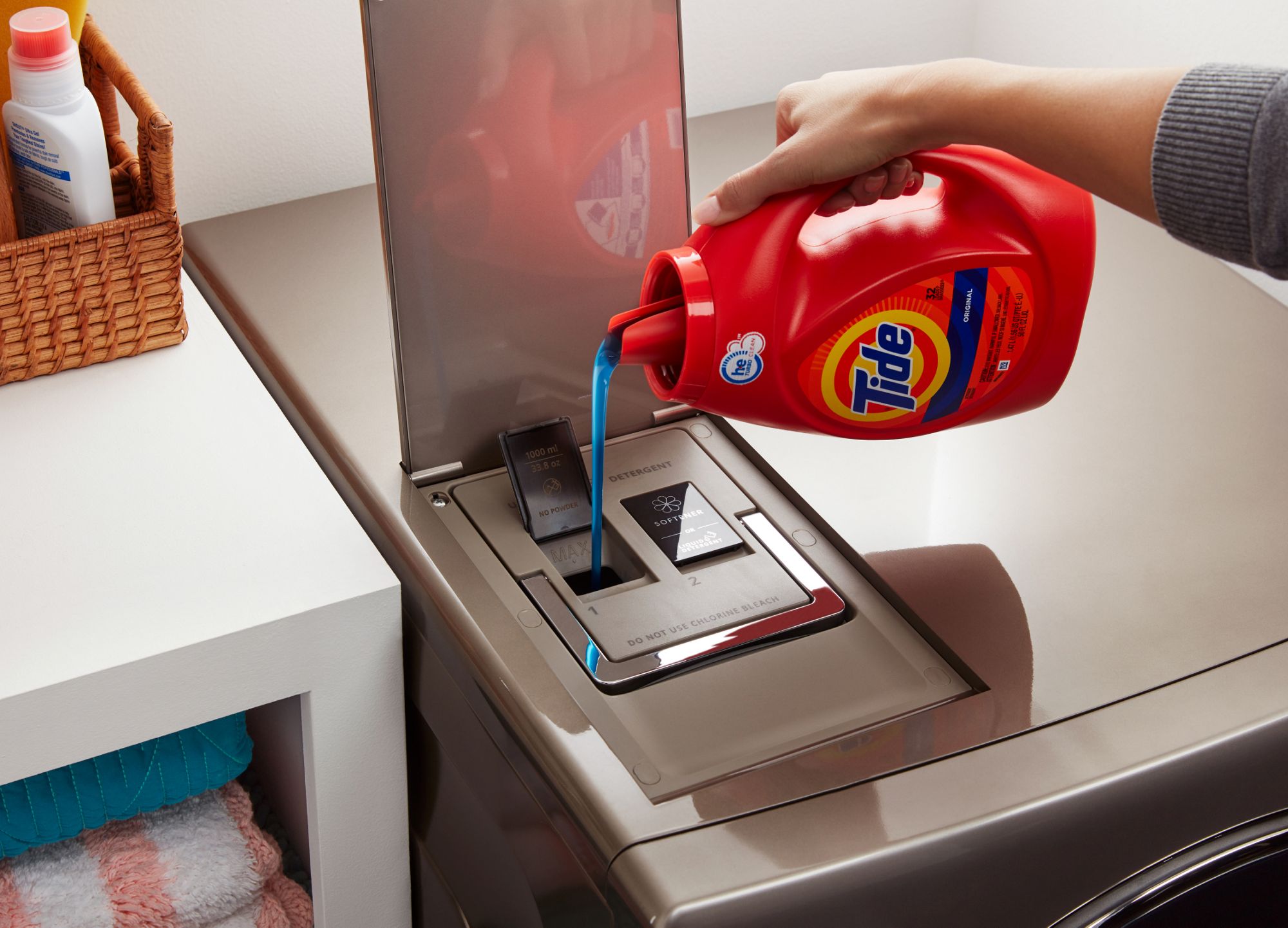 Pour detergent into the Load & Go™ Plus Dispenser.