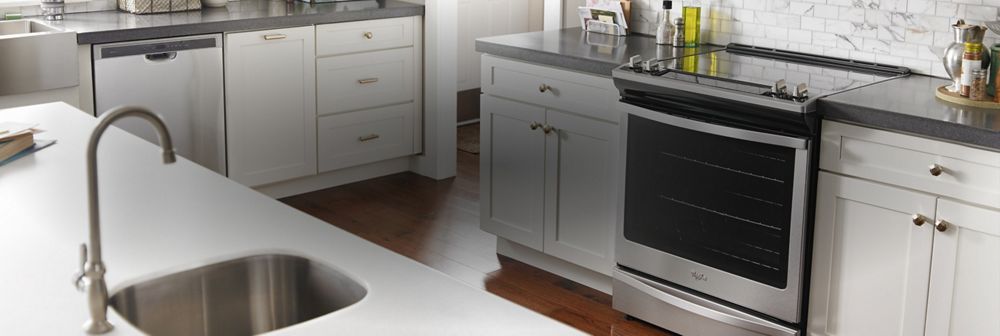 A kitchen with a Whirlpool® range.