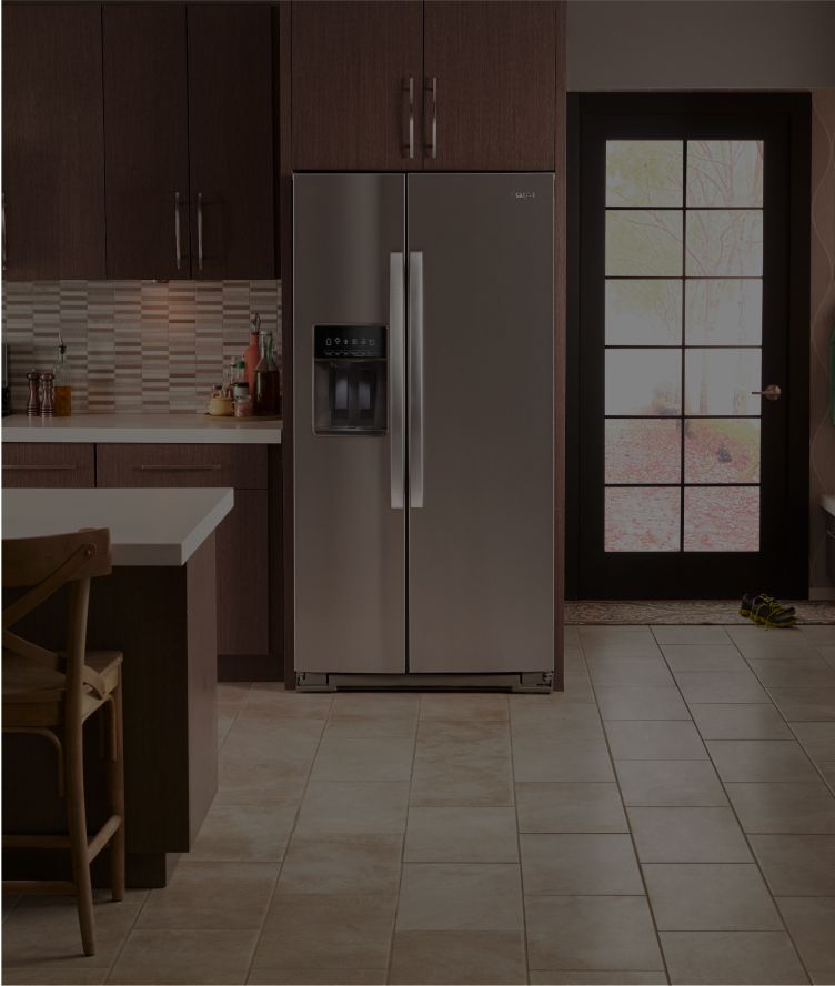 Whirlpool® kitchen suite featuring a range, side-by-side refrigerator and front-control dishwasher.