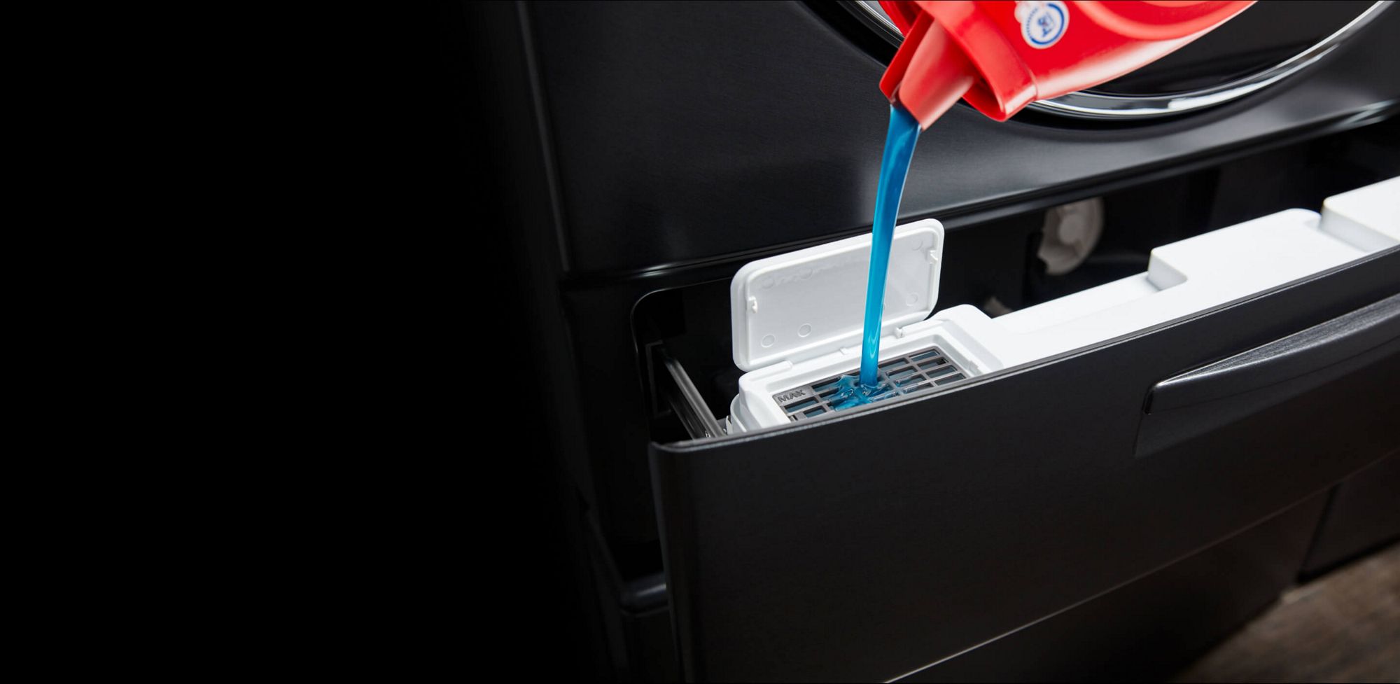 Front load washer with laundry soap dispenser