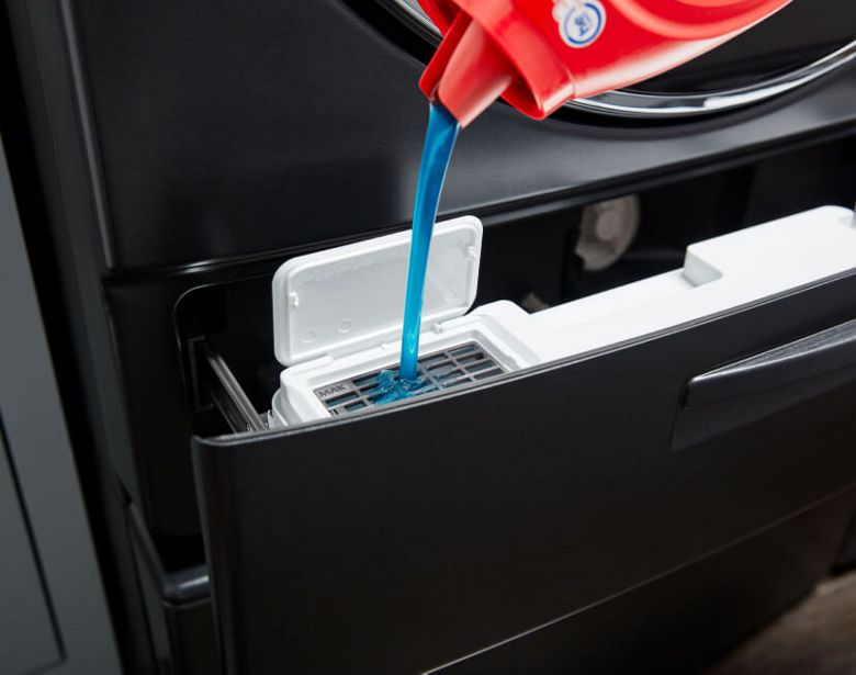 Front load washer with laundry soap dispenser