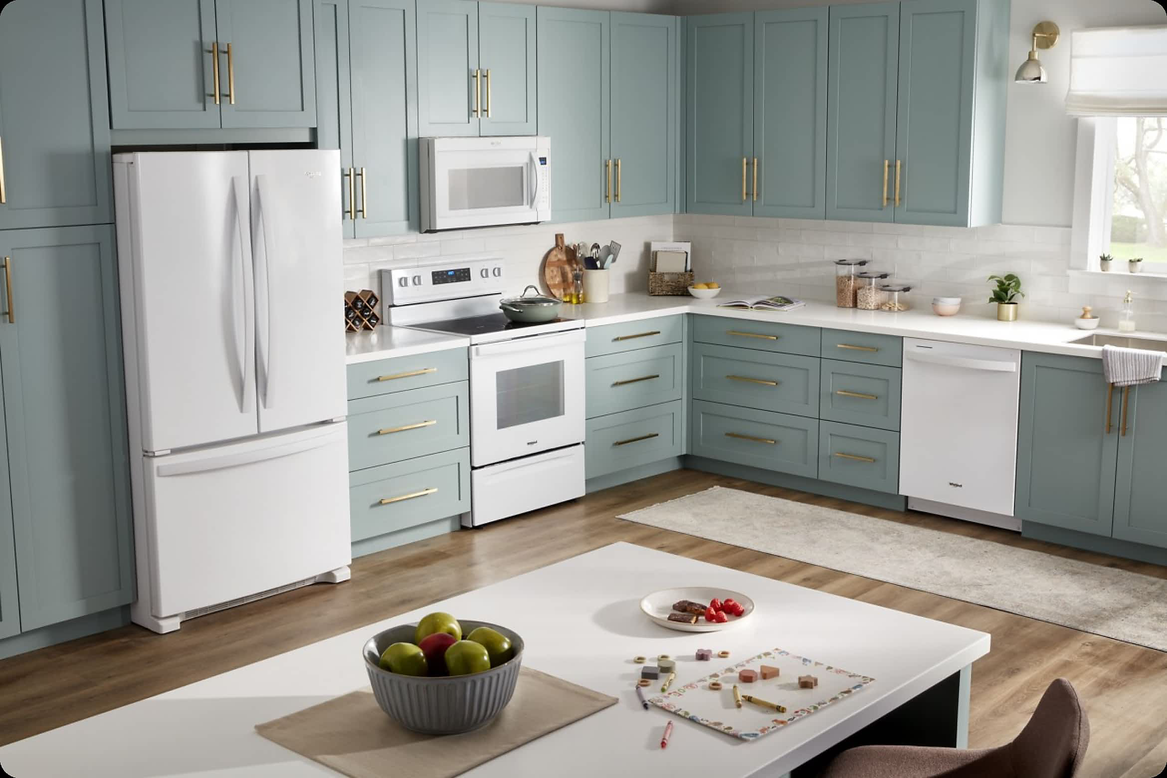 A bright kitchen full of White Whirlpool® Appliances