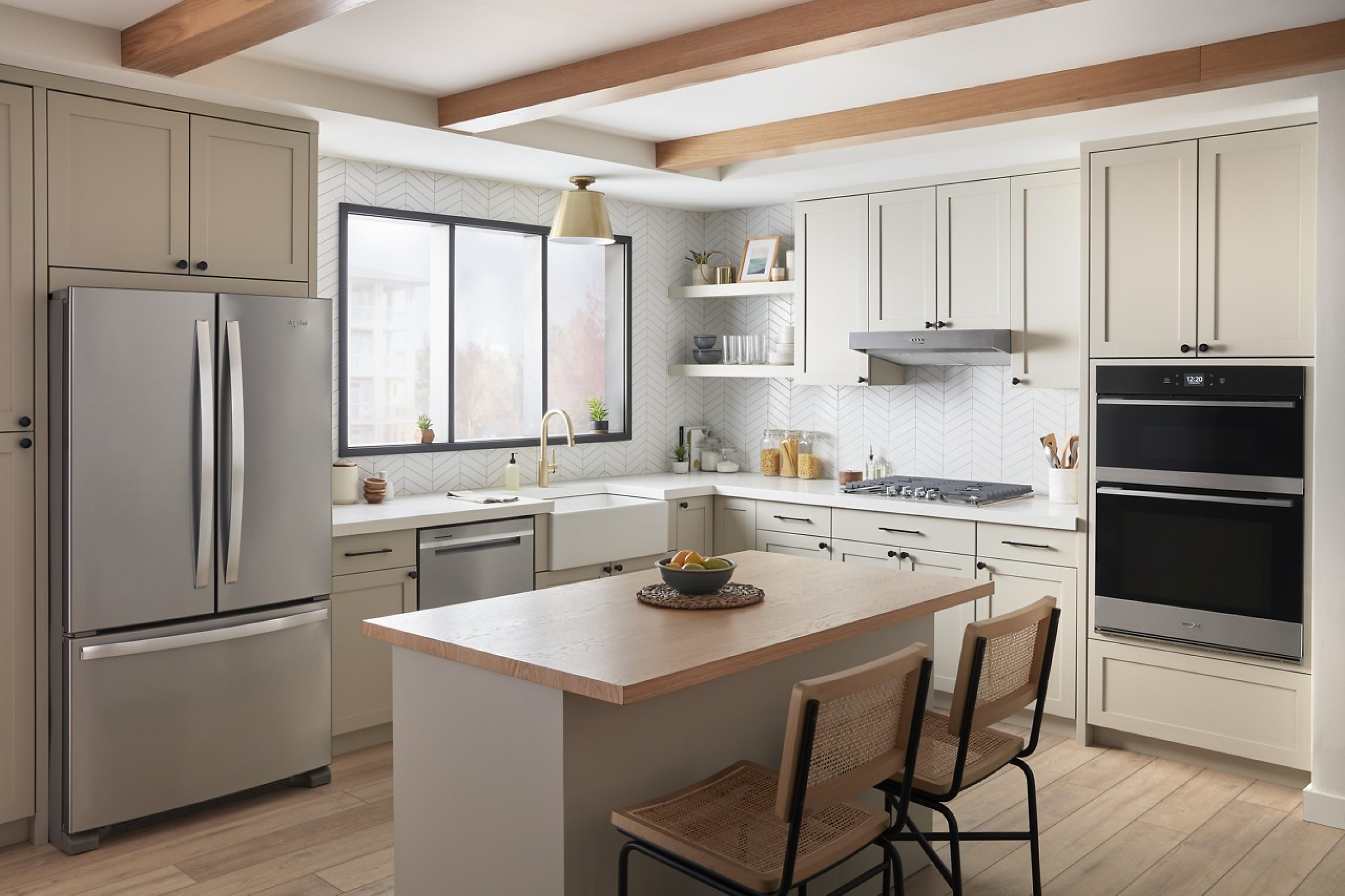 A modern, white kitchen full of Whirlpool® Appliances