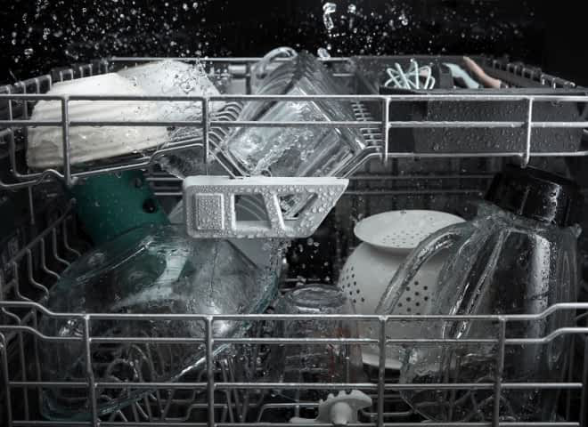 Water spraying on the 2nd and 3rd racks of a dishwasher