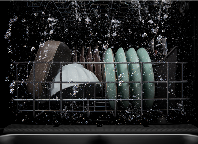 Dishes washing inside a Whirlpool® Dishwasher with the Boost Cycle