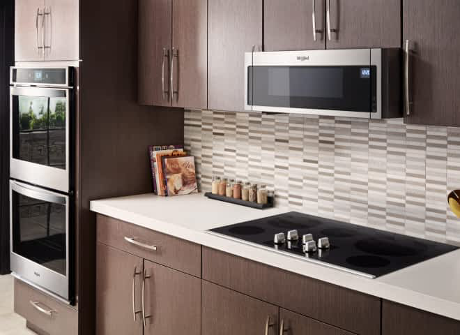 A Whirlpool® Low Profile Over-The-Range Microwave in a kitchen