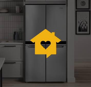 A Whirlpool® 4 Door Refrigerator in a kitchen with the Home Heartbeat blog logo 