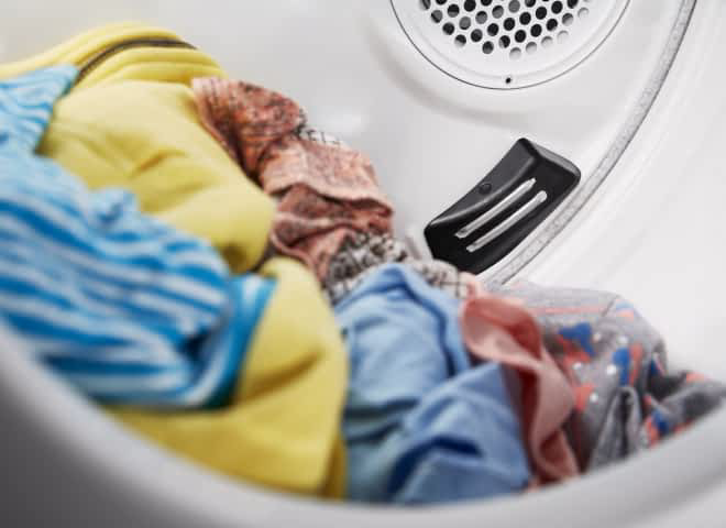The moisture sensors inside a Whirlpool® Stacked Laundry Center
