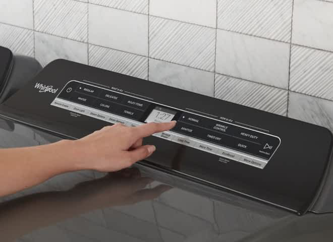 The controls on a Whirlpool® Top Load Matching Dryer