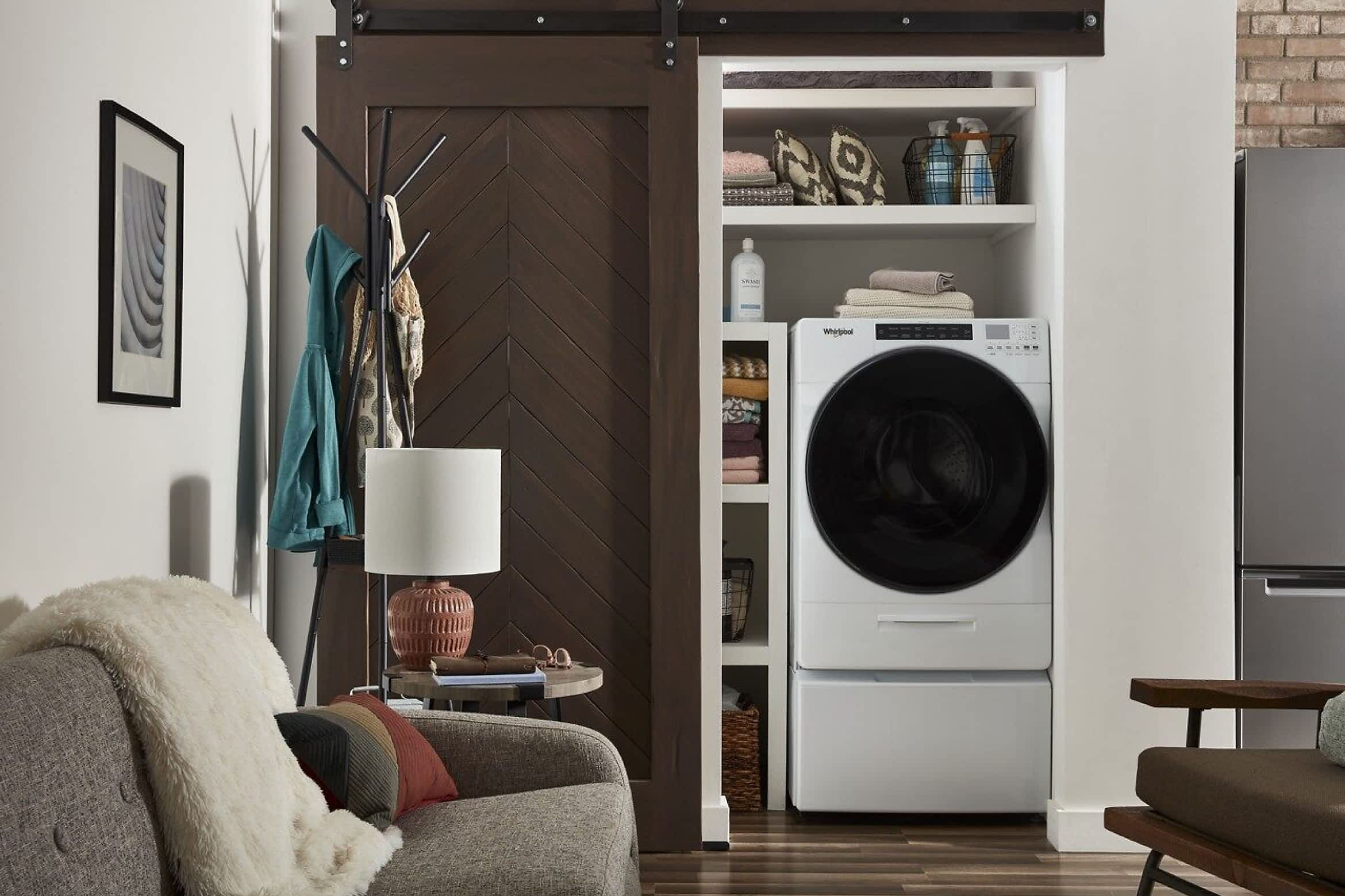 A Whirlpool® Front Load Washer on a Whirlpool® Laundry Pedestal
