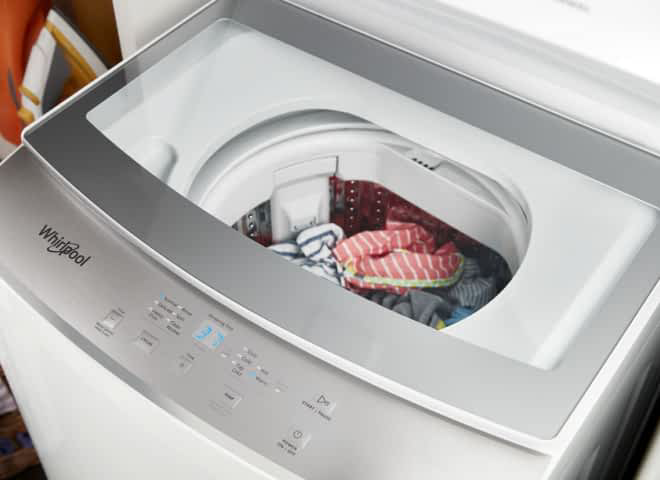 The EasyView™ Glass Lid with Slow-Close Technology on a Whirlpool® Stacked Laundry Center