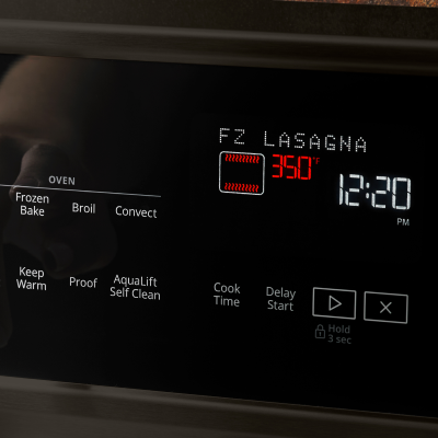 An oven control panel set to 350°F .