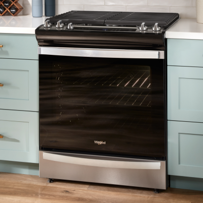 A Whirlpool® slide-in range with a warming drawer.