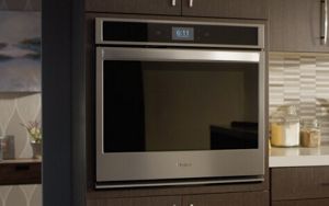 Wiping down a self-cleaning oven