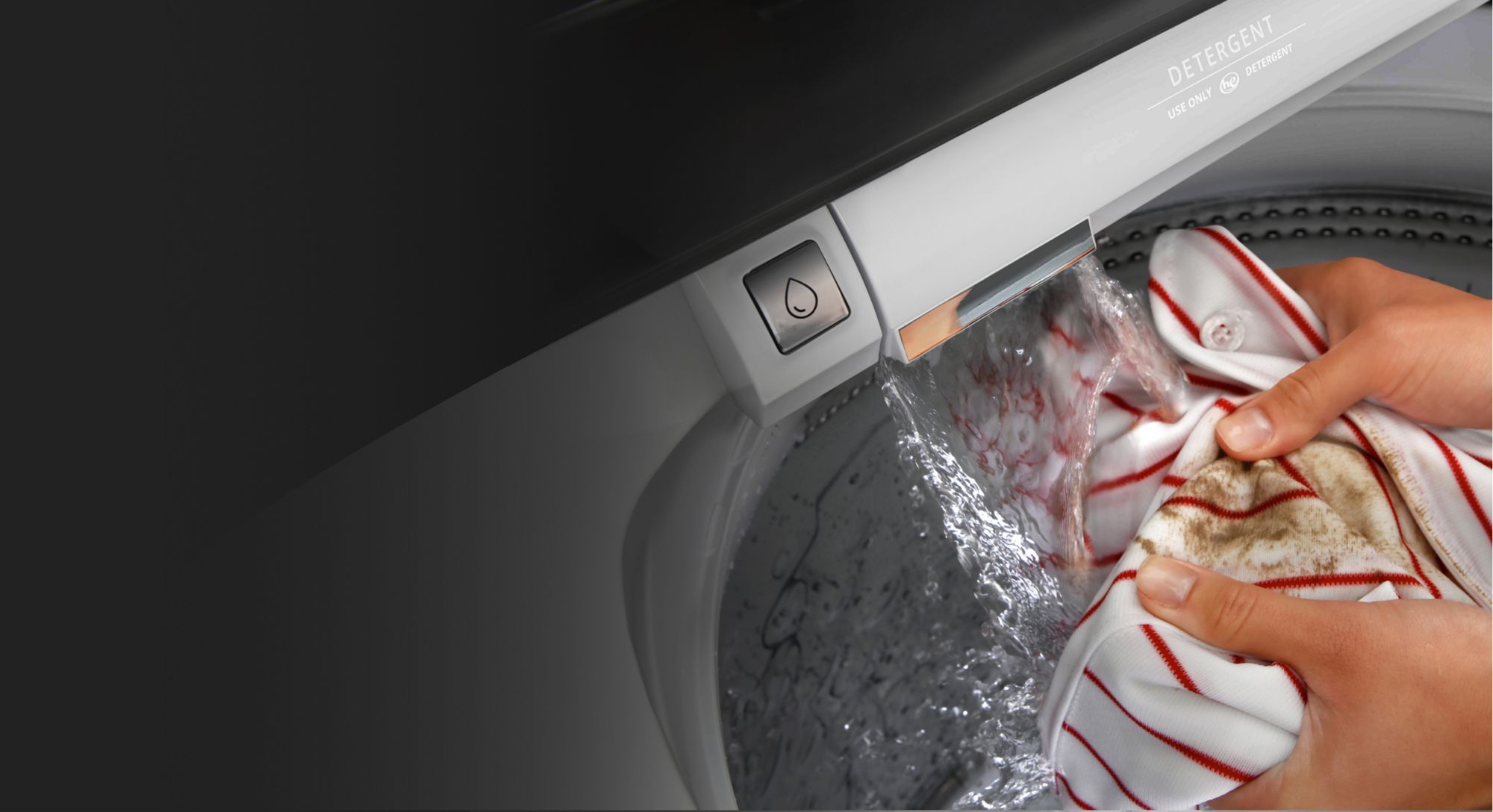 See how easy it is to treat stains in the washer with the built-in water faucet.