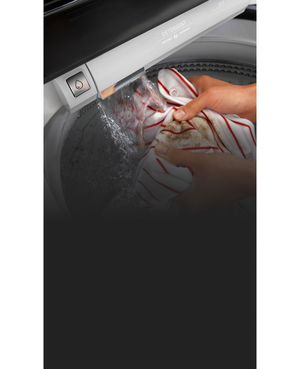 See how easy it is to treat stains in the washer with the built-in water faucet.