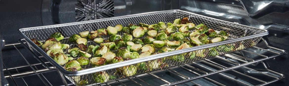 Brussels sprouts air frying in a Whirlpool® Standard Gas Range