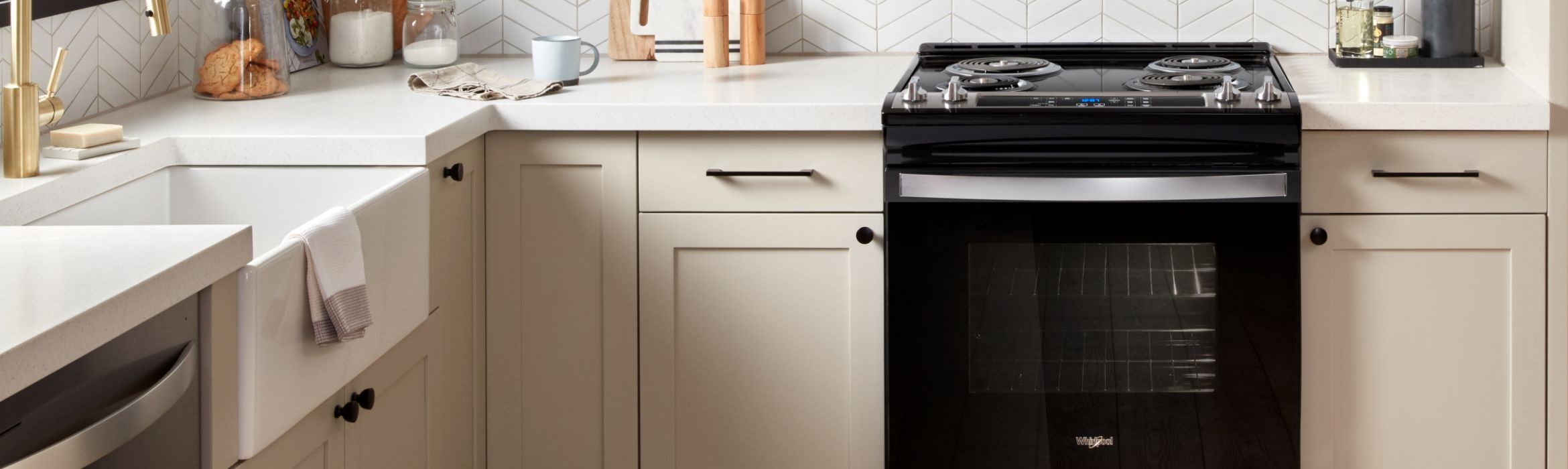 A bright, clean kitchen with a Whirlpool® Starter Electric Range