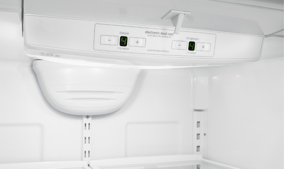 The interior of a Whirlpool refrigerator, showing the temperature control