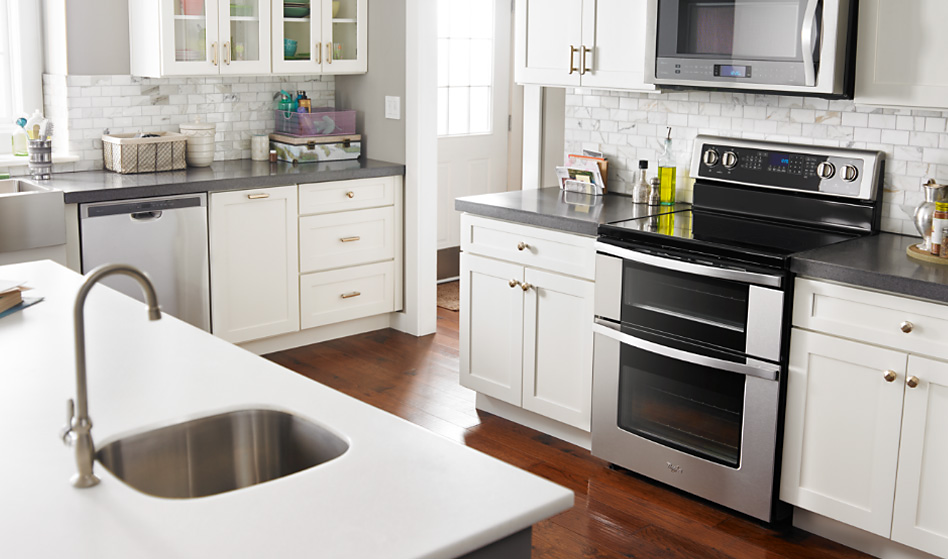 A modern kitchen featuring various Whirlpool appliances