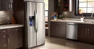 Various stainless steel Whirlpool appliances are showcased in a modern kitchen