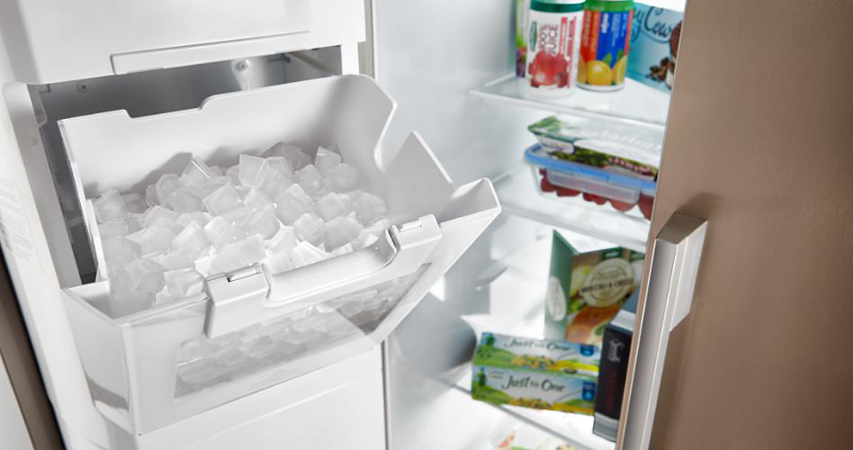 An ice compartment can be seen on the left door of a refrigerator