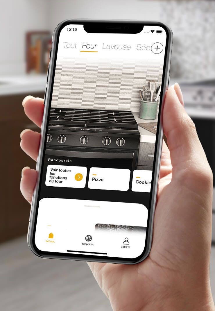 Using the Whirlpool® app on a smartphone to check the progress of what’s cooking in your connected oven.