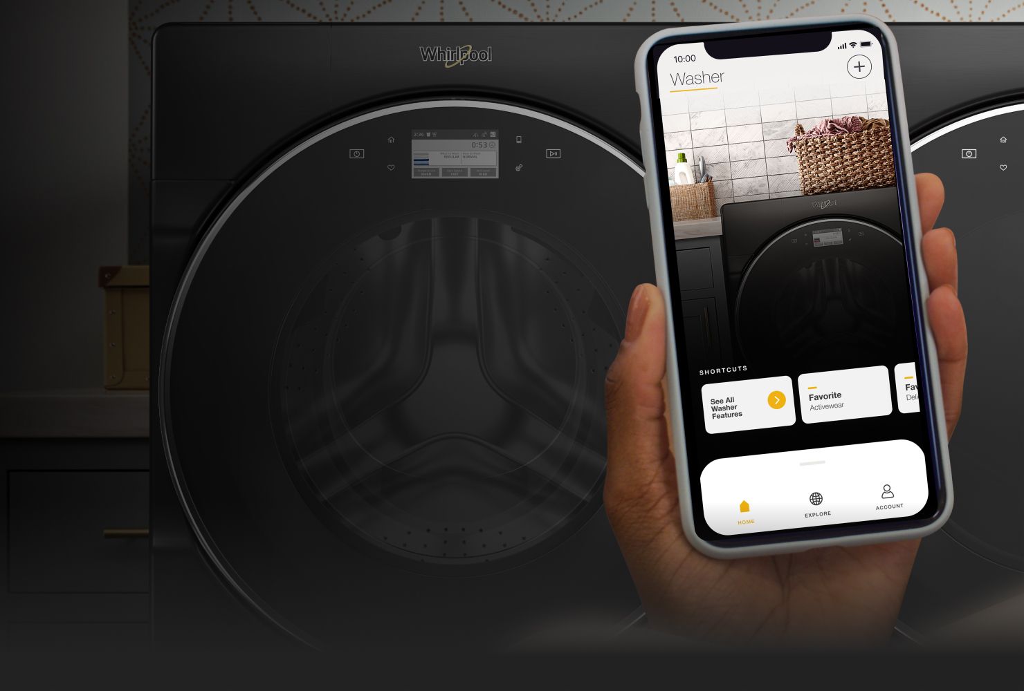Smartphone with My Home screen in the Whirlpool® app in front of laundry pair