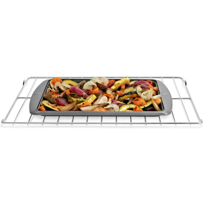Roasted vegetables in pan on oven rack