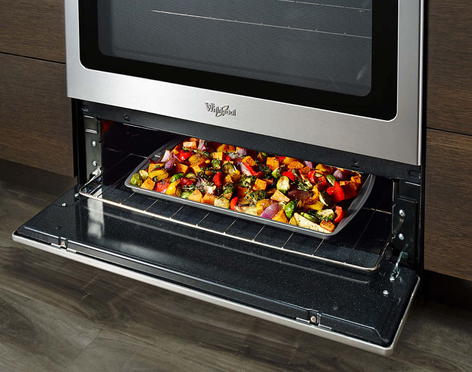 Vegetables roasting in under-oven broiling drawer