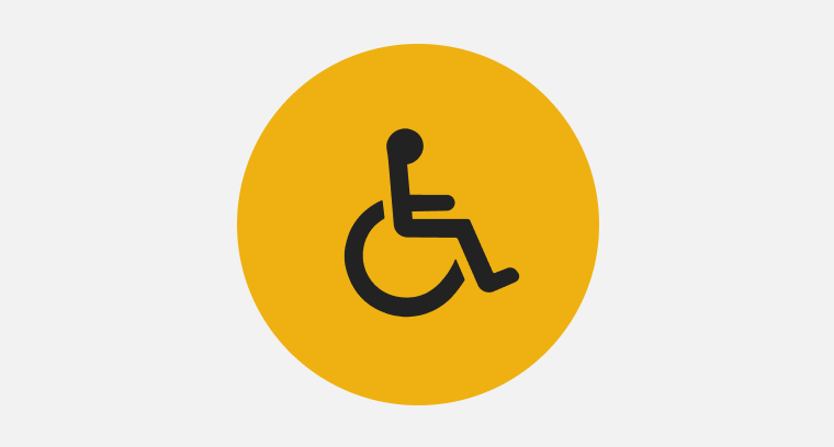 An icon representing a person in a wheelchair