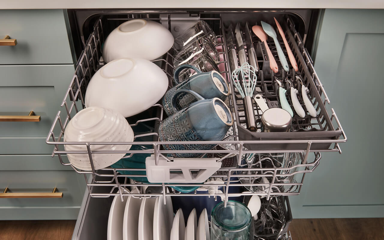 Whirlpool® Dishwashers with a 3rd Rack with Extra Wash Action help you fit what your family piles up.