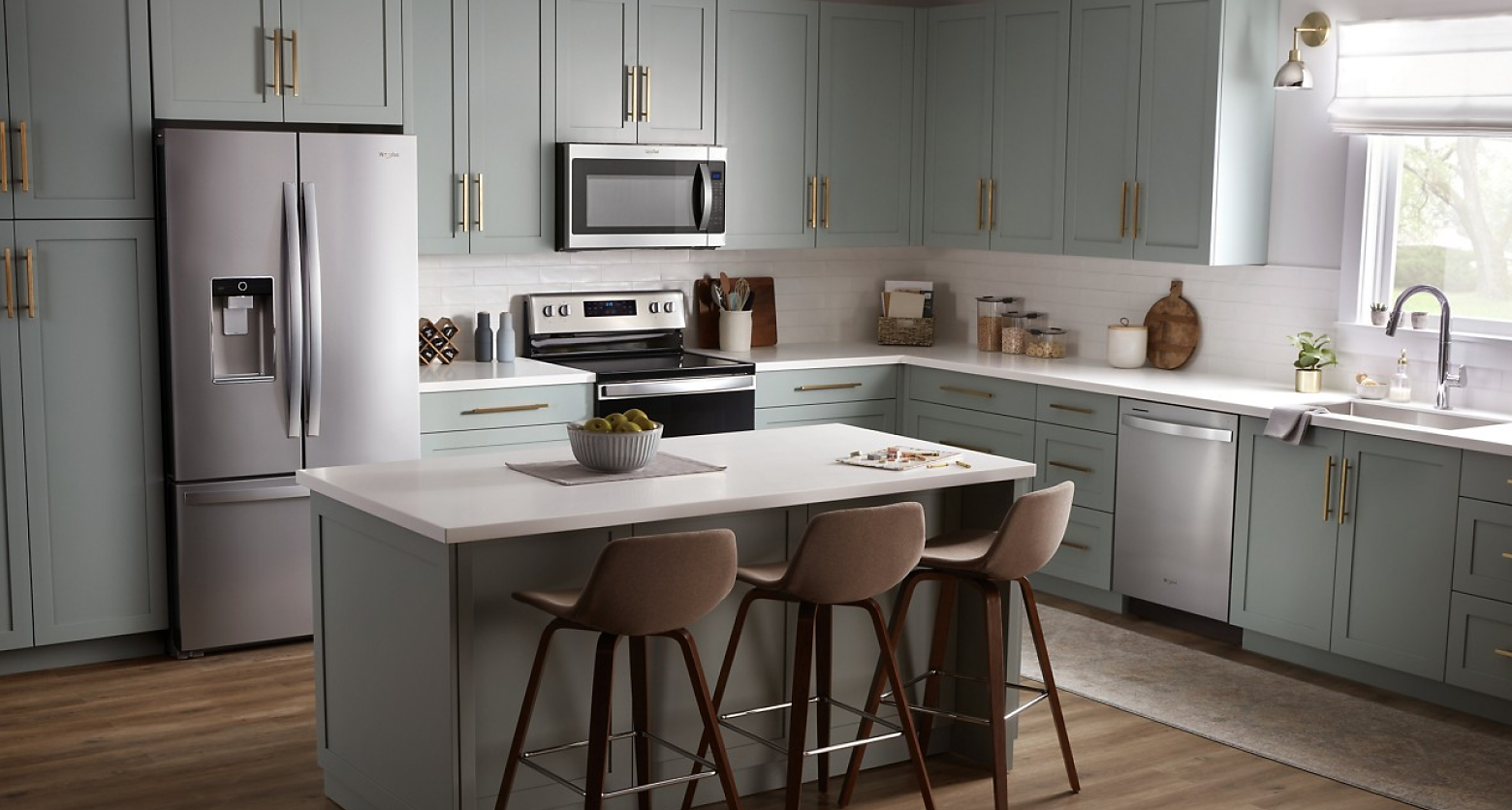 Gray kitchen featuring Whirlpool® stainless steel appliances 