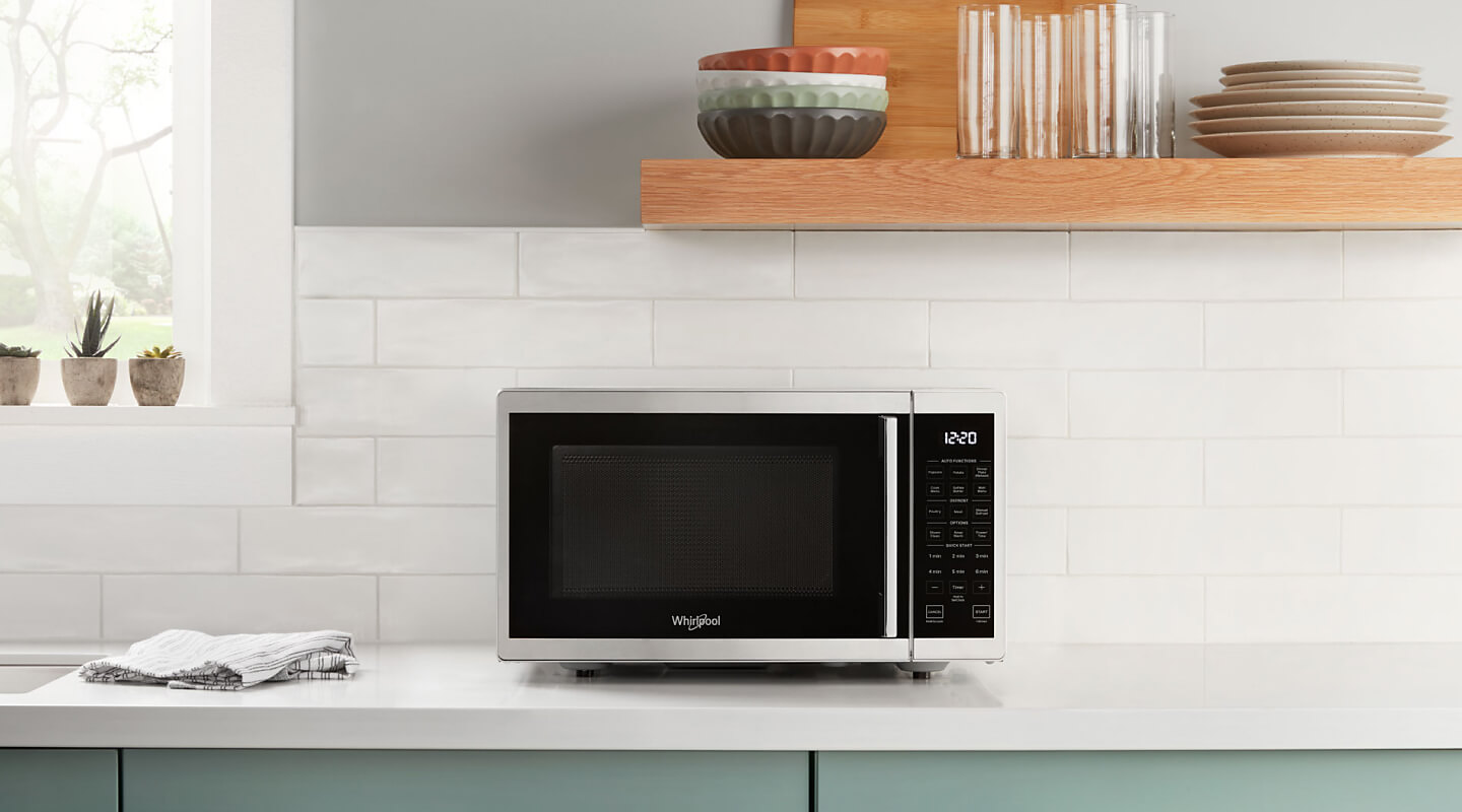 Whirlpool® microwave on a kitchen counter