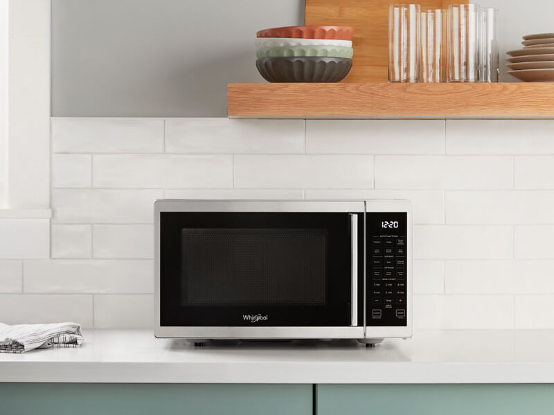 Whirlpool® microwave on a kitchen counter