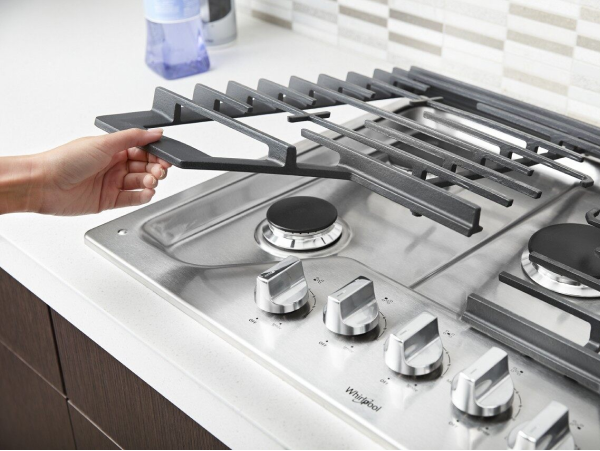 Hand lifting cooktop grate