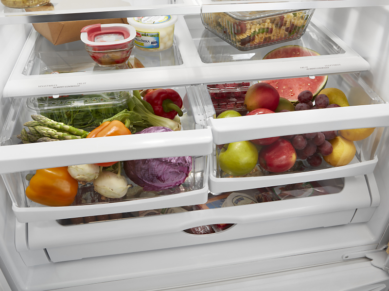 Open crisper drawers filled with food
