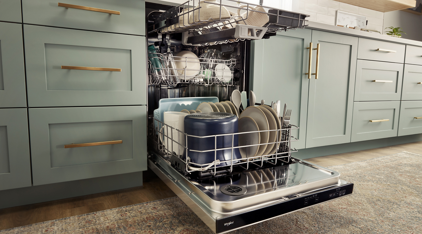 Dishes loaded on the three racks of a Whirlpool® dishwasher
