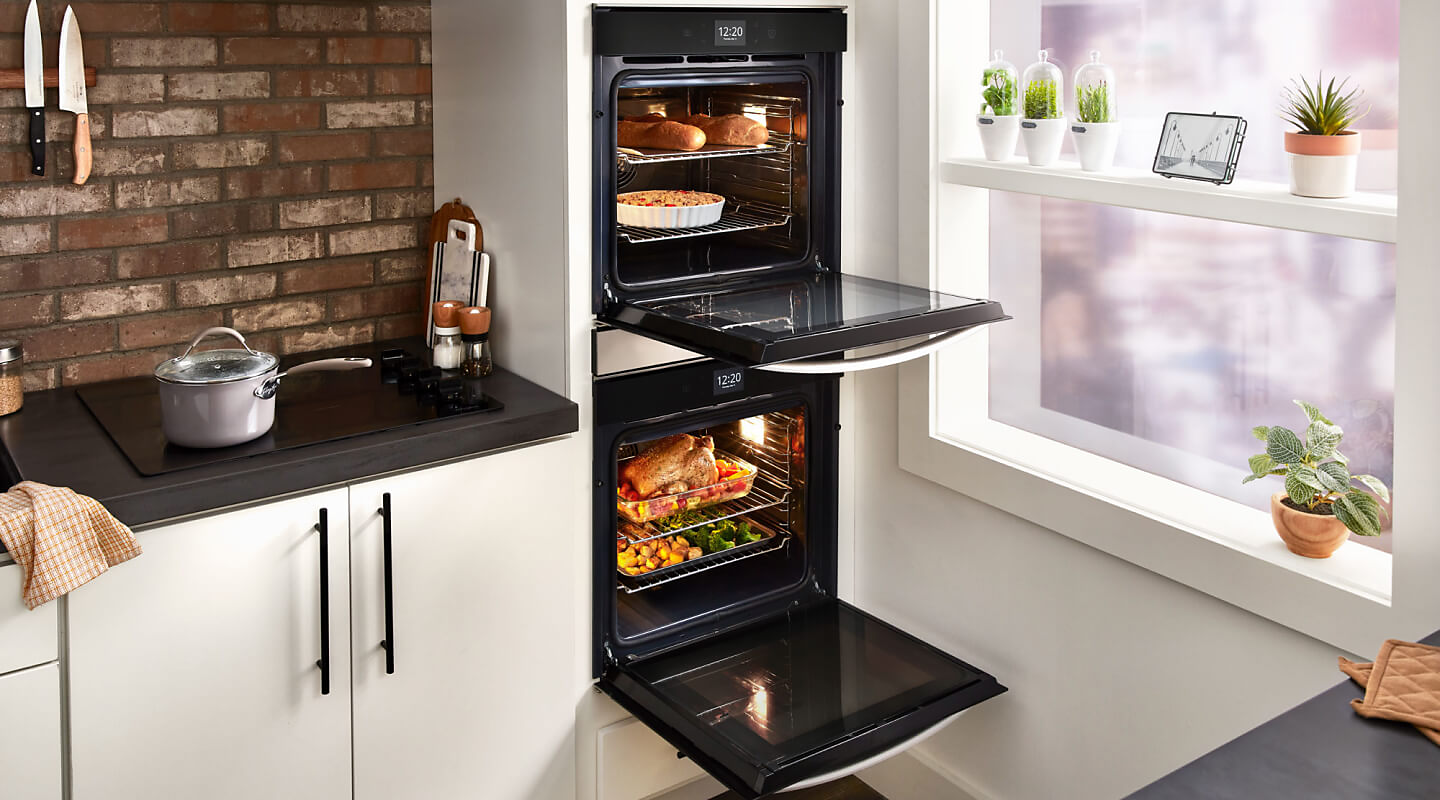 Multiple dishes cooking inside a Whirlpool® double wall oven