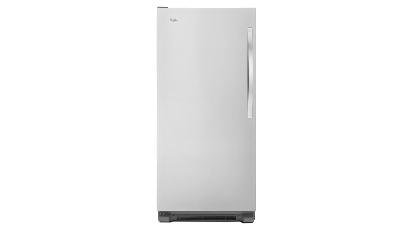 A white upright freezer against a white background