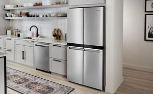 A Whirlpool® 4 Door Refrigerator in a white kitchen