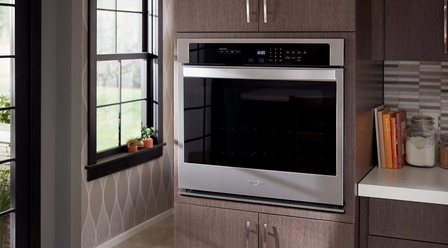 Whirlpool® single wall oven installed in a modern kitchen