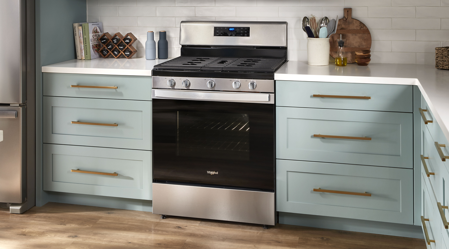 Whirlpool® range in blue cabinetry