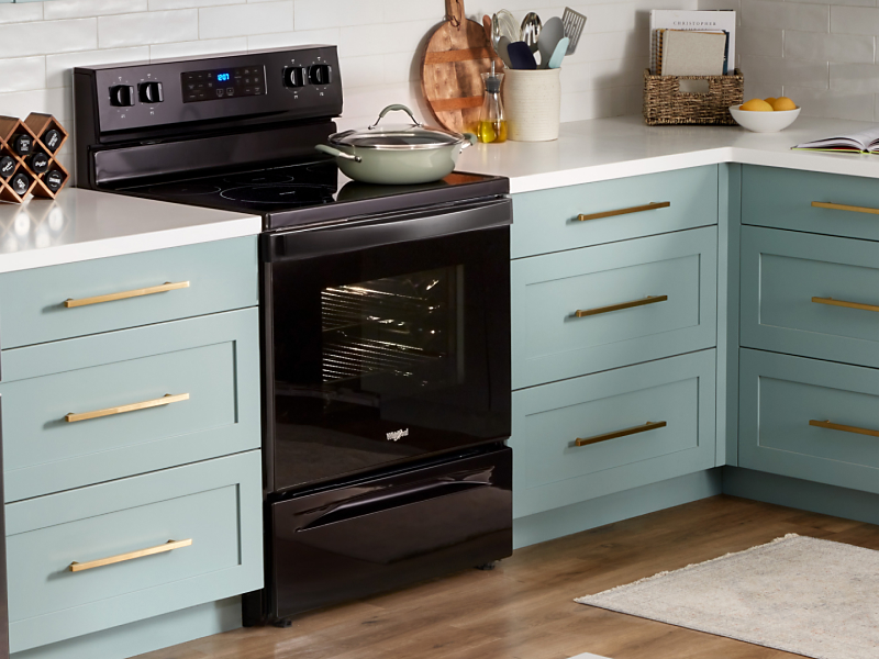 A Whirlpool® oven with Air Fry Mode in a modern kitchen. 