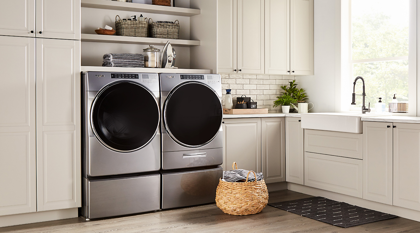 Washer and dryer set in laundry room