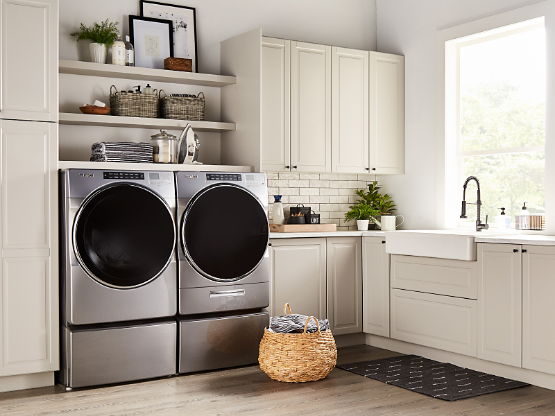 Washer and dryer set in laundry room