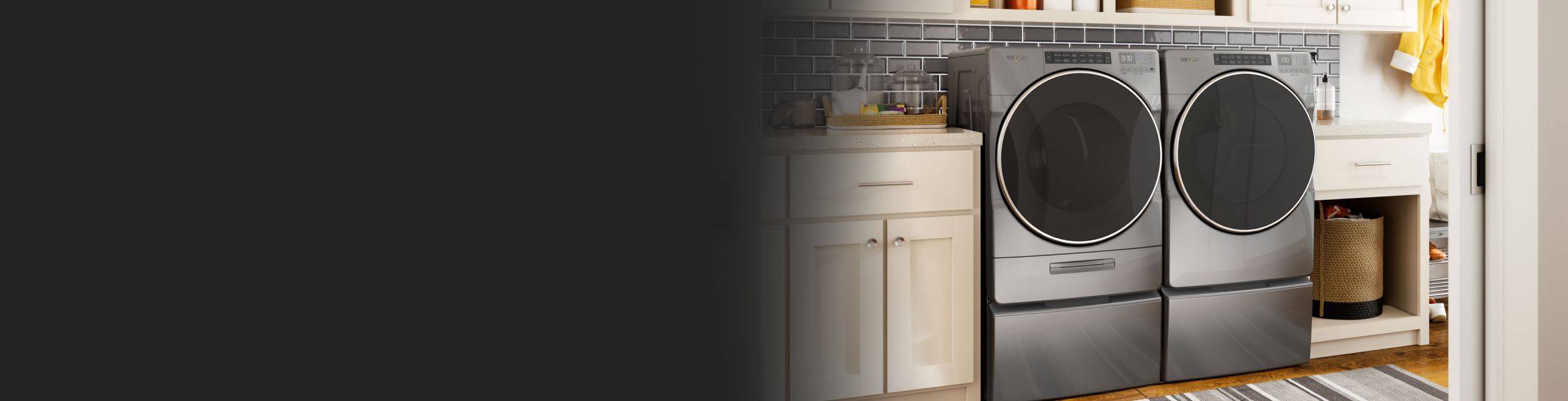 A Whirlpool® Washer and Dryer in a laundry room