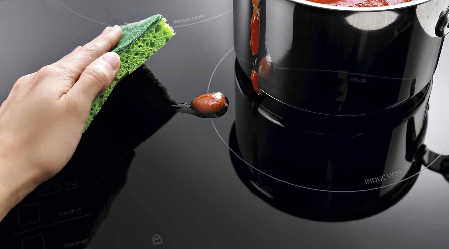 Removing spills from the stove top