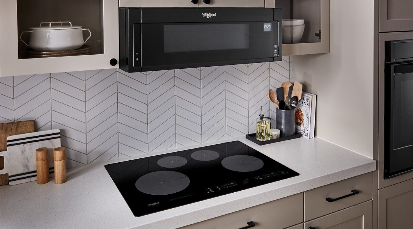 Picture of a Whirlpool® induction cooktop in a kitchen.